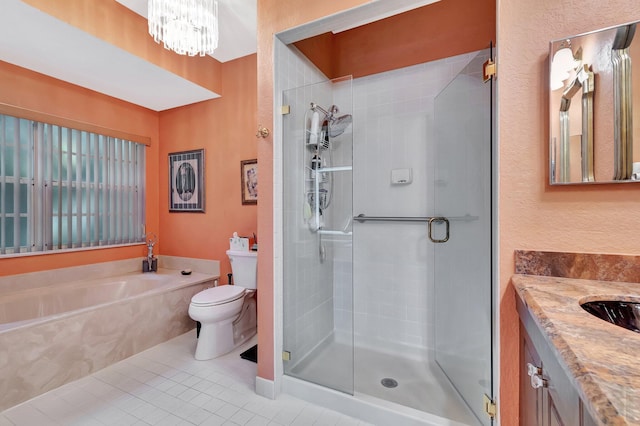 full bathroom featuring independent shower and bath, a chandelier, vanity, toilet, and tile patterned floors