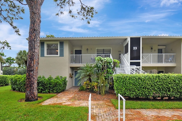 view of front of property with a front lawn