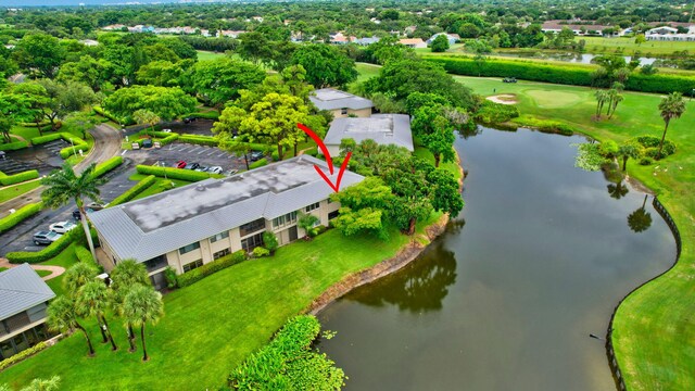 bird's eye view with a water view