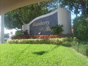 community sign with a lawn