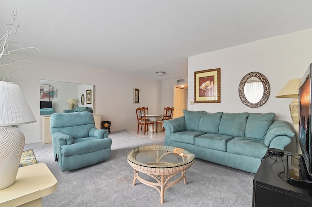 living room featuring light colored carpet