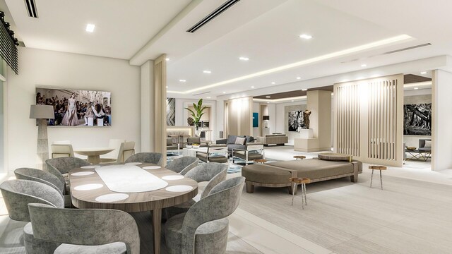 dining space featuring recessed lighting, visible vents, and a tray ceiling