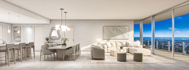 dining space featuring baseboards and a chandelier