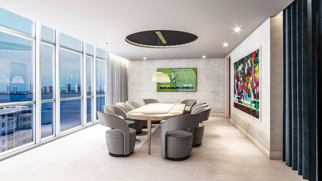 dining area featuring recessed lighting and expansive windows