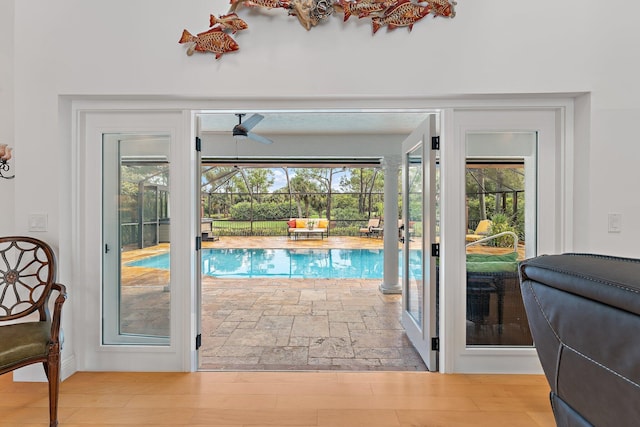 view of swimming pool featuring ceiling fan