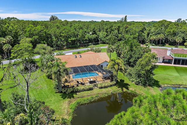 aerial view featuring a water view and a view of trees