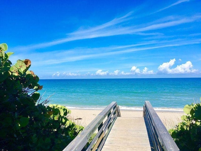 water view featuring a beach view