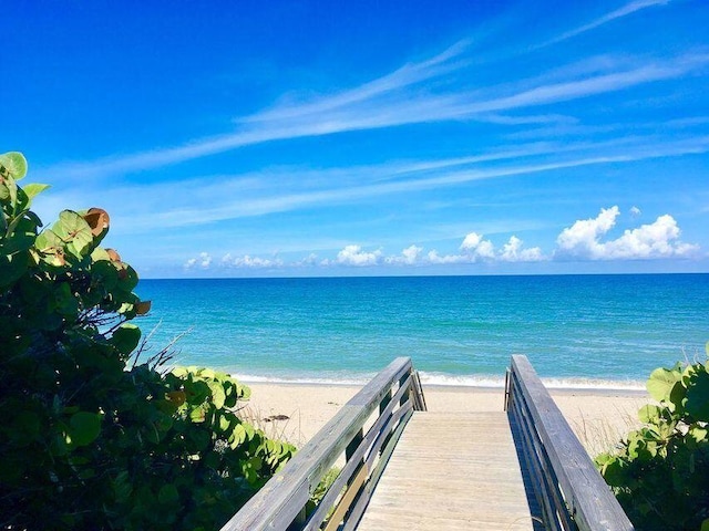 property view of water featuring a view of the beach