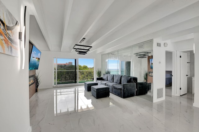 living room with beam ceiling