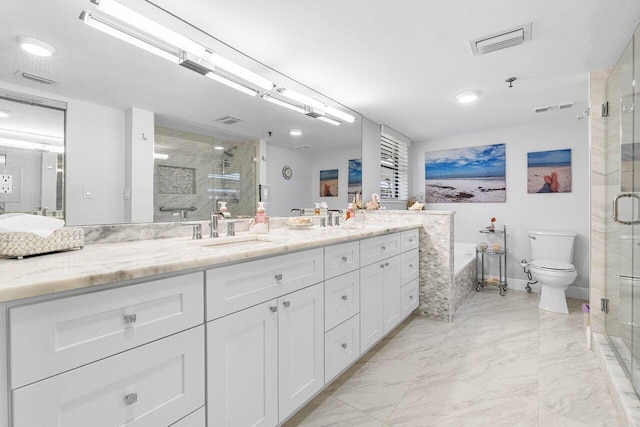 bathroom with tile patterned floors, vanity, walk in shower, and toilet