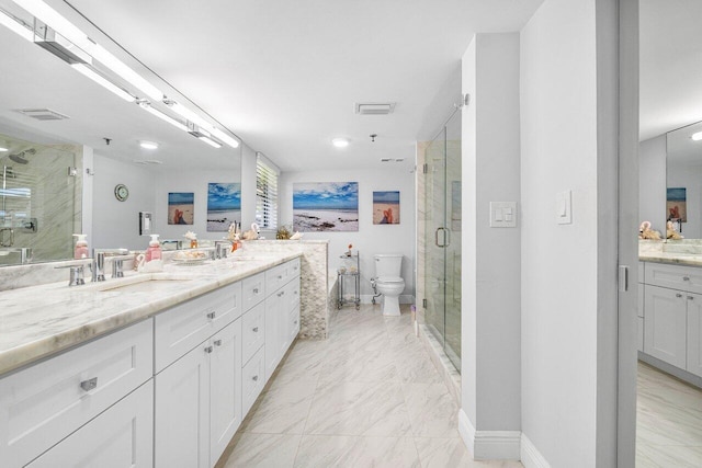 bathroom featuring tile patterned floors, toilet, an enclosed shower, and vanity