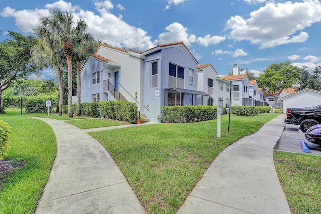 exterior space featuring a front yard