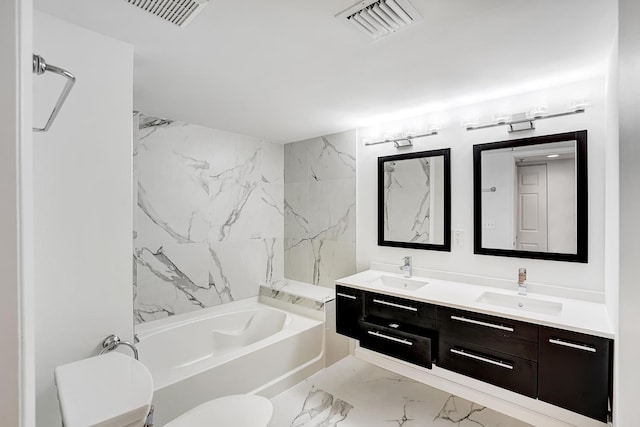 bathroom featuring toilet, marble finish floor, visible vents, and a sink