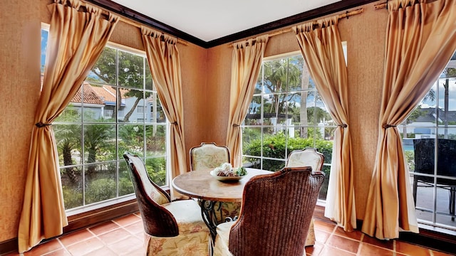 dining space featuring light tile patterned flooring