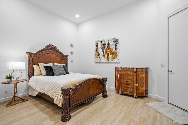 bedroom featuring light hardwood / wood-style floors