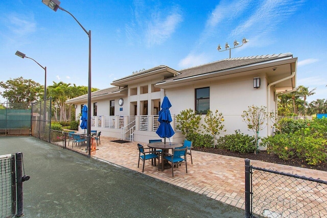 rear view of house featuring a patio area