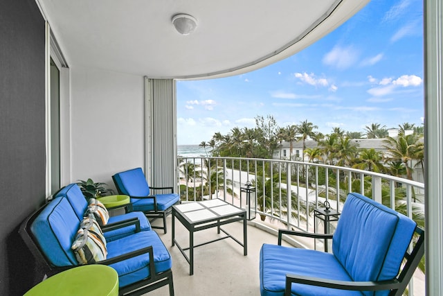 balcony featuring a water view