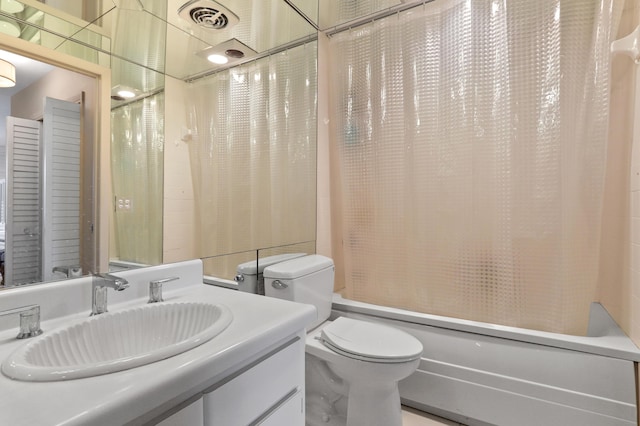 bathroom with toilet, shower / bath combo, visible vents, and vanity