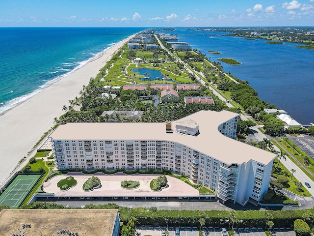 aerial view featuring a water view and a view of the beach