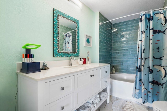 full bathroom featuring tile patterned flooring, shower / bathtub combination with curtain, a textured ceiling, toilet, and vanity