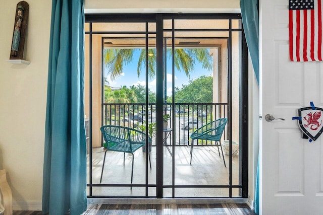 doorway featuring dark hardwood / wood-style flooring