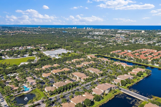 drone / aerial view with a water view