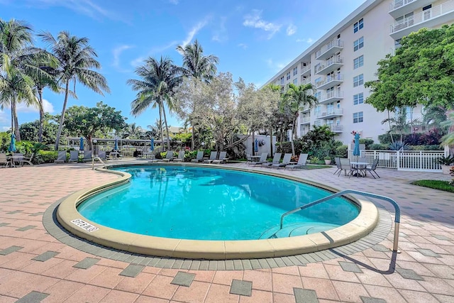 view of swimming pool with a patio area