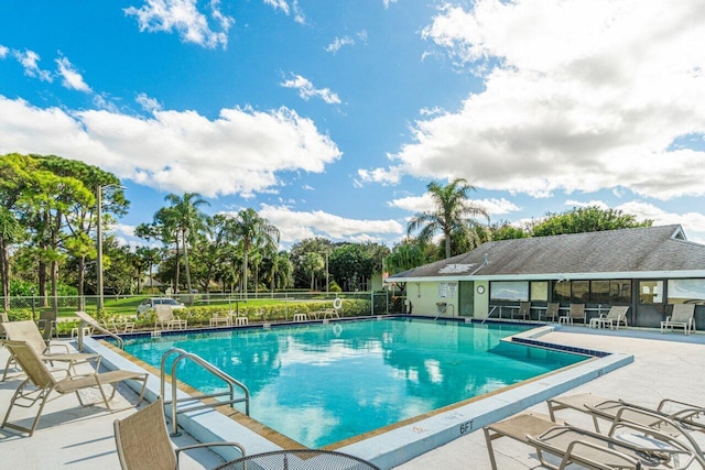 view of pool featuring a patio