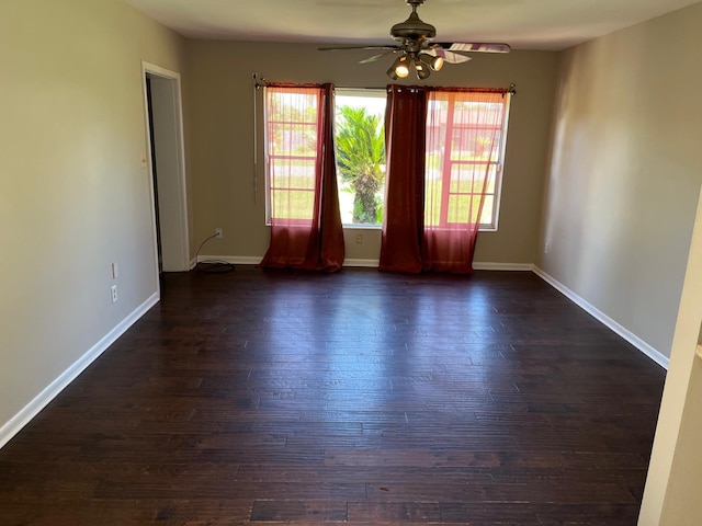 empty room featuring ceiling fan and wood-type flooring