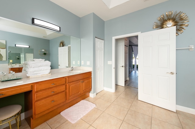 bathroom featuring vanity and tile patterned flooring