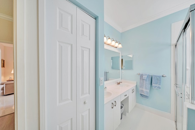 bathroom with tile patterned flooring, dual vanity, and ornamental molding