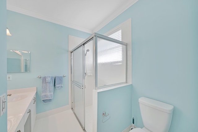 bathroom featuring ornamental molding, vanity, tile patterned flooring, an enclosed shower, and toilet