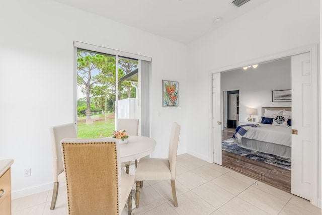 dining space featuring light hardwood / wood-style flooring