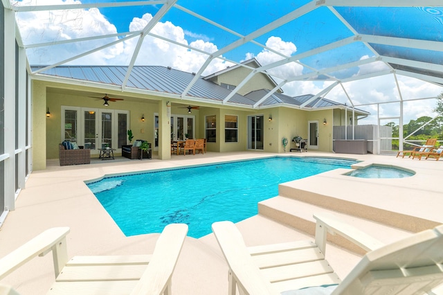 view of pool featuring ceiling fan, a lanai, an outdoor living space, french doors, and a patio area