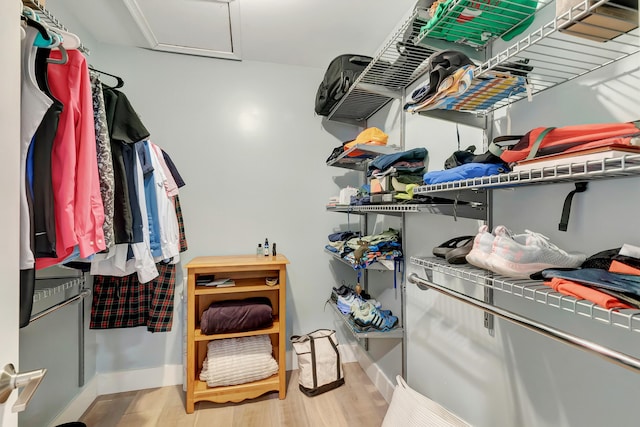 walk in closet featuring light wood-type flooring