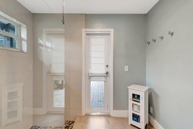 entrance foyer featuring light tile patterned floors