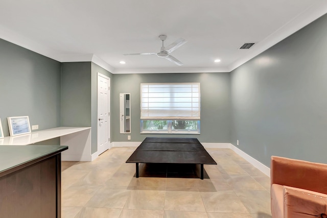 dining area featuring ceiling fan, ornamental molding, and light tile patterned floors