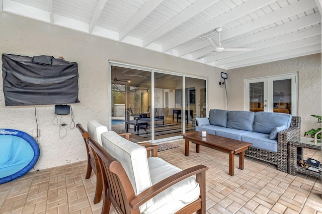 view of patio / terrace featuring french doors, ceiling fan, and an outdoor hangout area