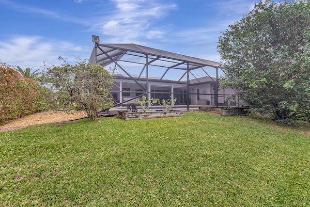 view of yard featuring glass enclosure