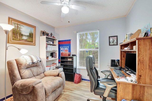 office with ceiling fan, a textured ceiling, and light hardwood / wood-style flooring