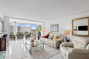 living room with a textured ceiling