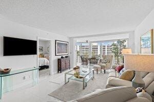 living room with a textured ceiling