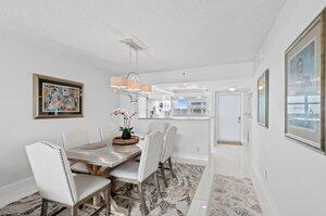 3212 S Ocean Blvd Unit 807-A, Highland Beach, FL 33487 - dining area featuring baseboards