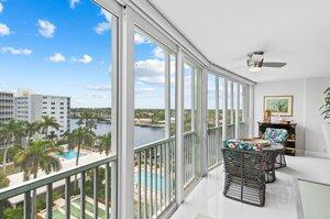 3212 S Ocean Blvd Unit 807-A, Highland Beach, FL 33487 - sunroom / solarium with a water view and ceiling fan