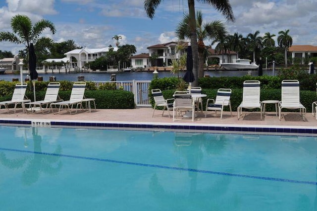 3212 S Ocean Blvd Unit 807-A, Highland Beach, FL 33487 - community pool with a patio area and a water view