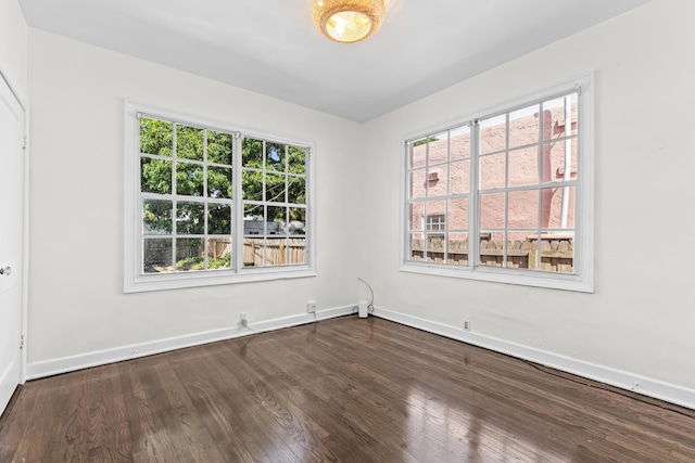 435 35th St, West Palm Beach, FL 33407 - unfurnished room featuring wood finished floors and baseboards