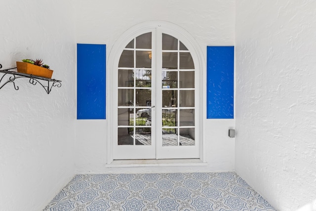 435 35th St, West Palm Beach, FL 33407 - entrance to property with french doors and stucco siding