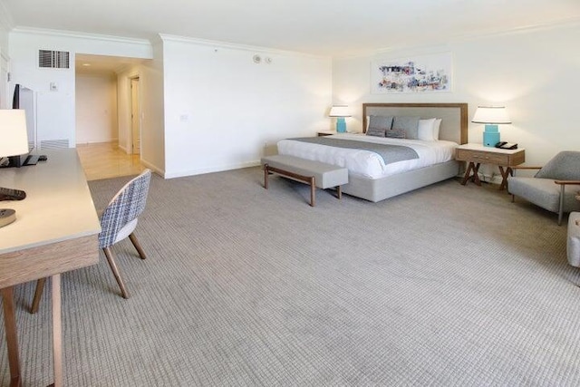 carpeted bedroom with crown molding