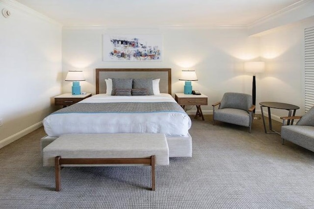 carpeted bedroom featuring ornamental molding