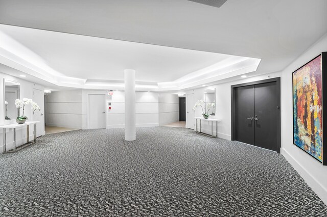 finished basement featuring carpet, baseboards, and recessed lighting